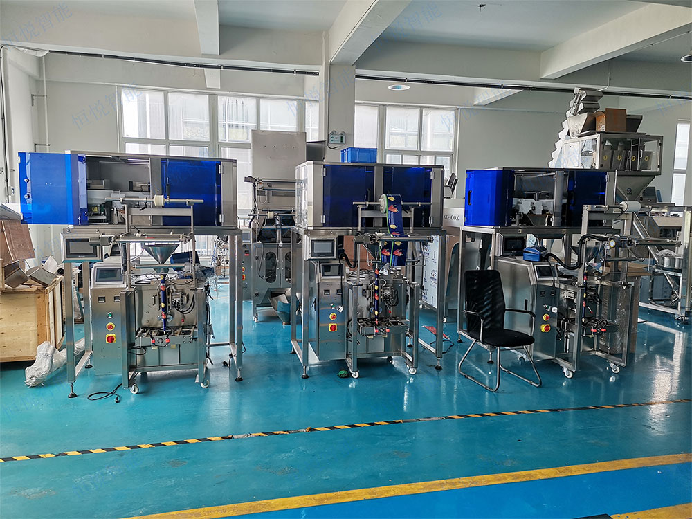 高精度稱重式顆粒包裝機.jpg 高精度稱重式顆粒包裝機.jpg